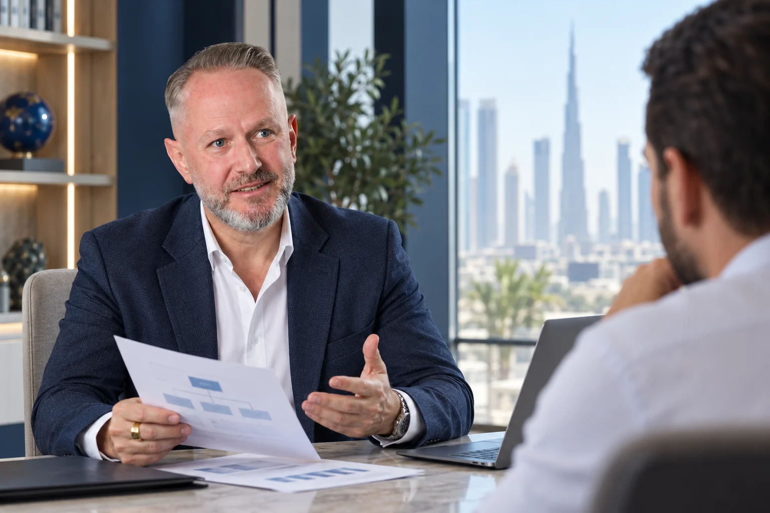 Gareth Jones advising a business owner on a UAE company structure.
