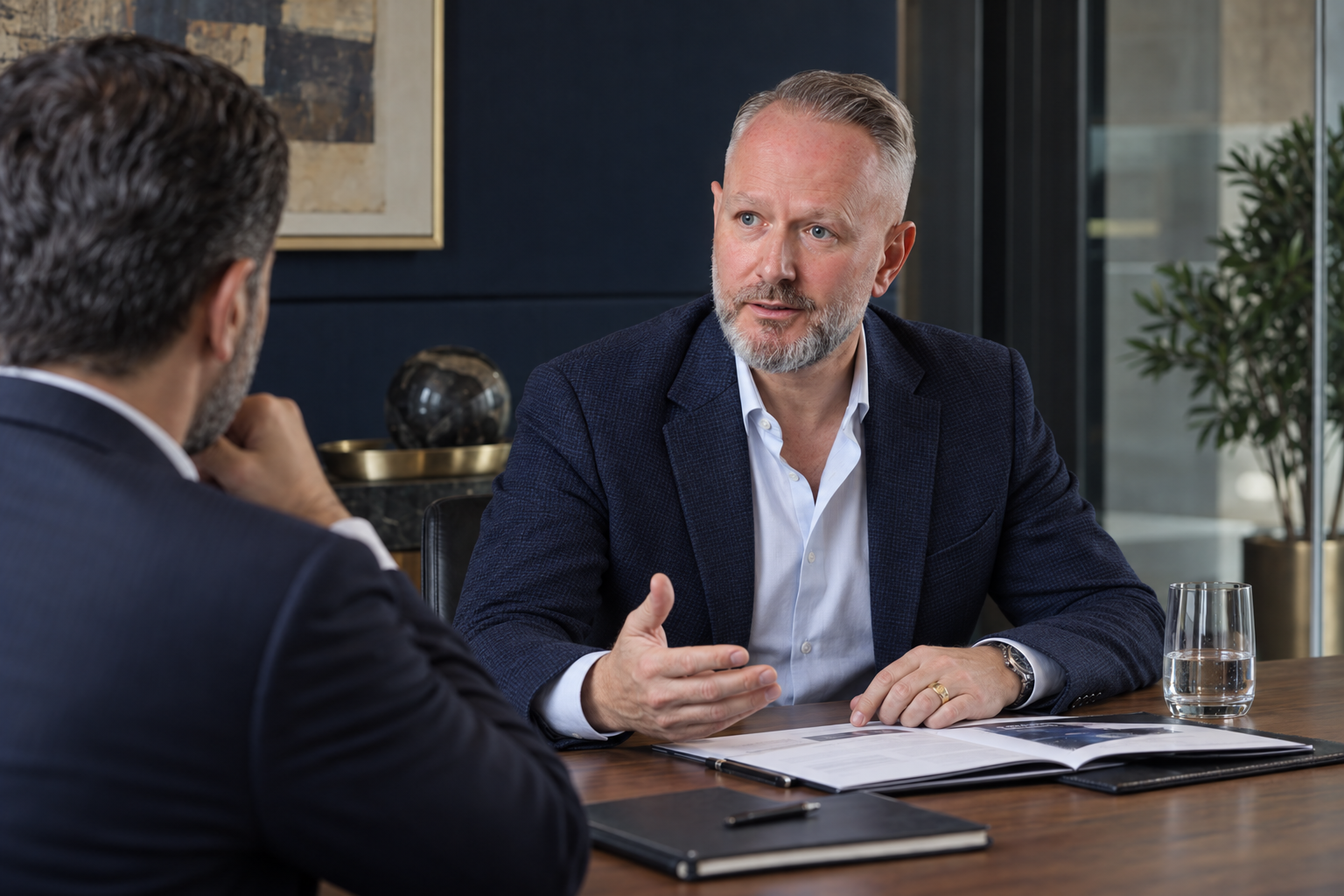 Gareth Jones discussing a UAE business setup plan with a client.